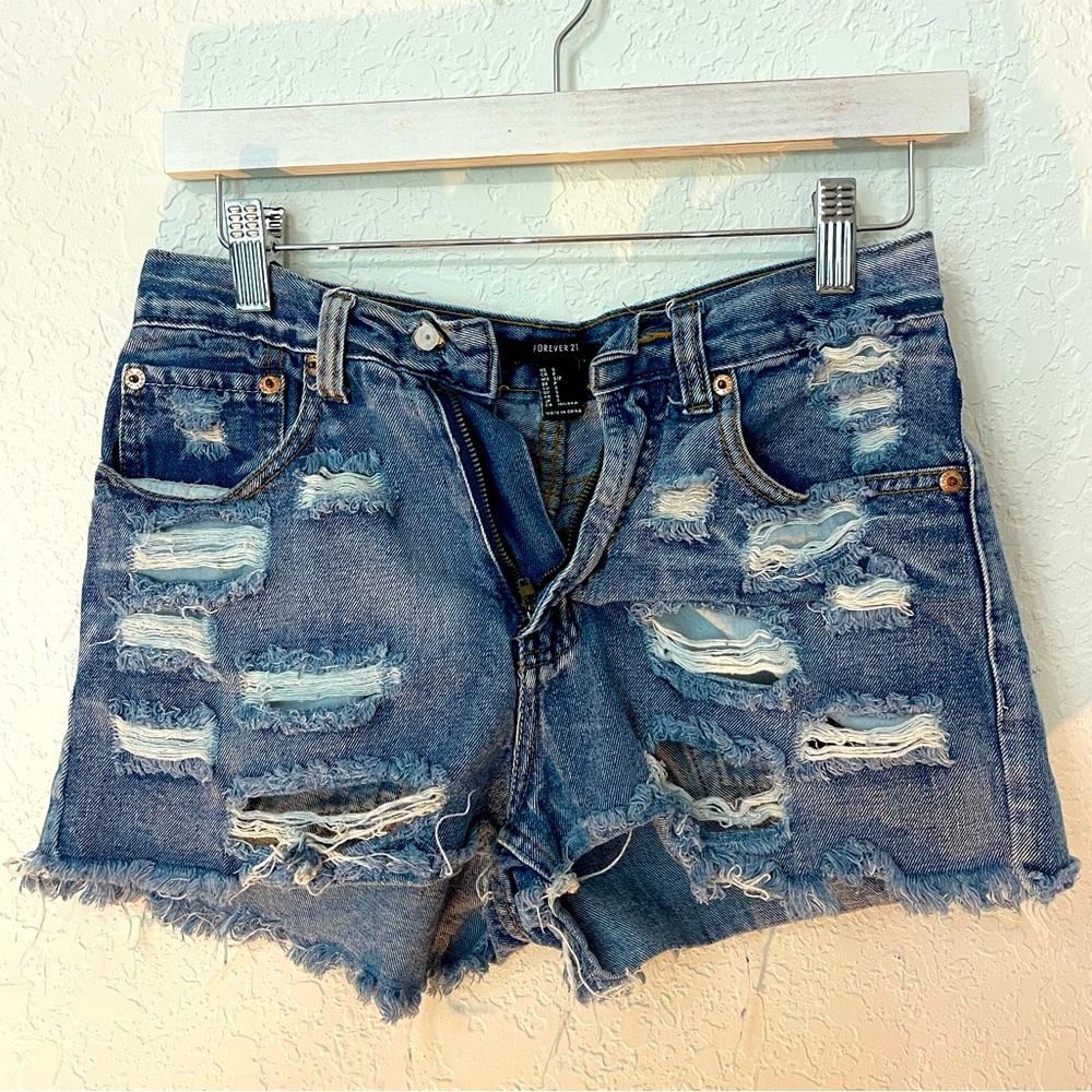 High waisted denim jeans | ripped frayed design | faded dark blue